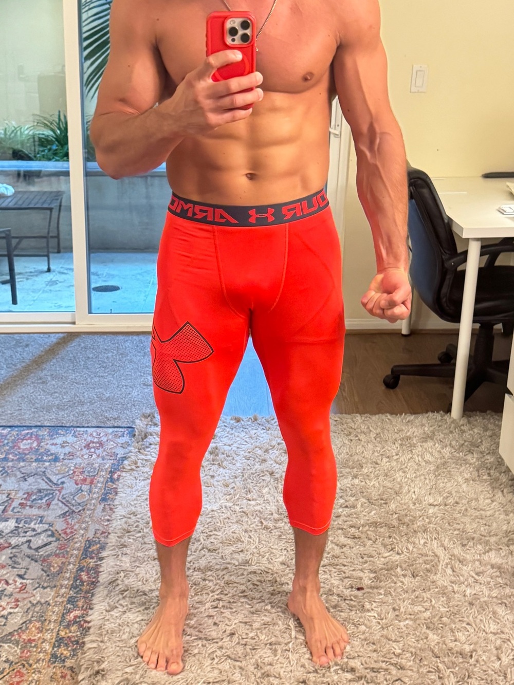 Under Armour Men’s bright orange leggings